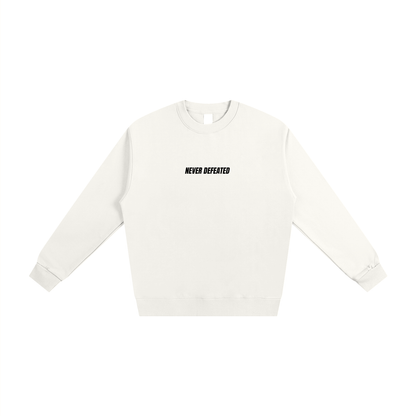NEVER DEFEATED HEAVYWEIGHT SWEATSHIRT ‘WHITE’