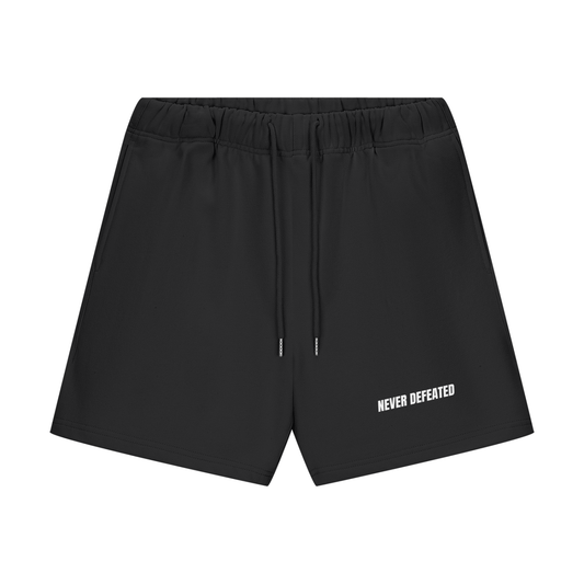 NEVER DEFEATED SHORTS ‘BLACK’
