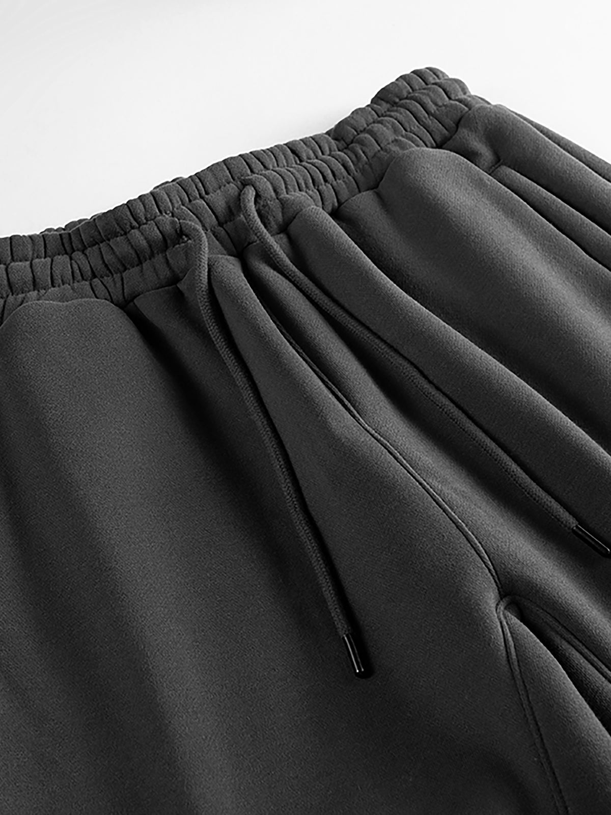 NEVER DEFEATED FLEECE JOGGERS ‘WHITE’