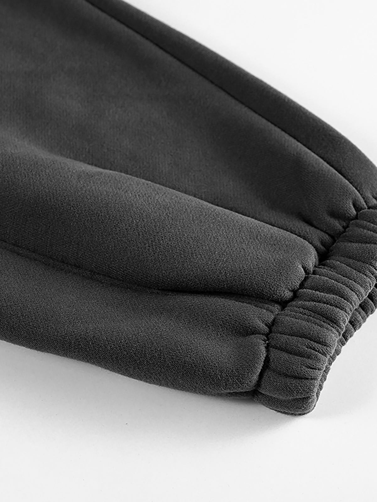 NEVER DEFEATED FLEECE JOGGERS ‘WHITE’
